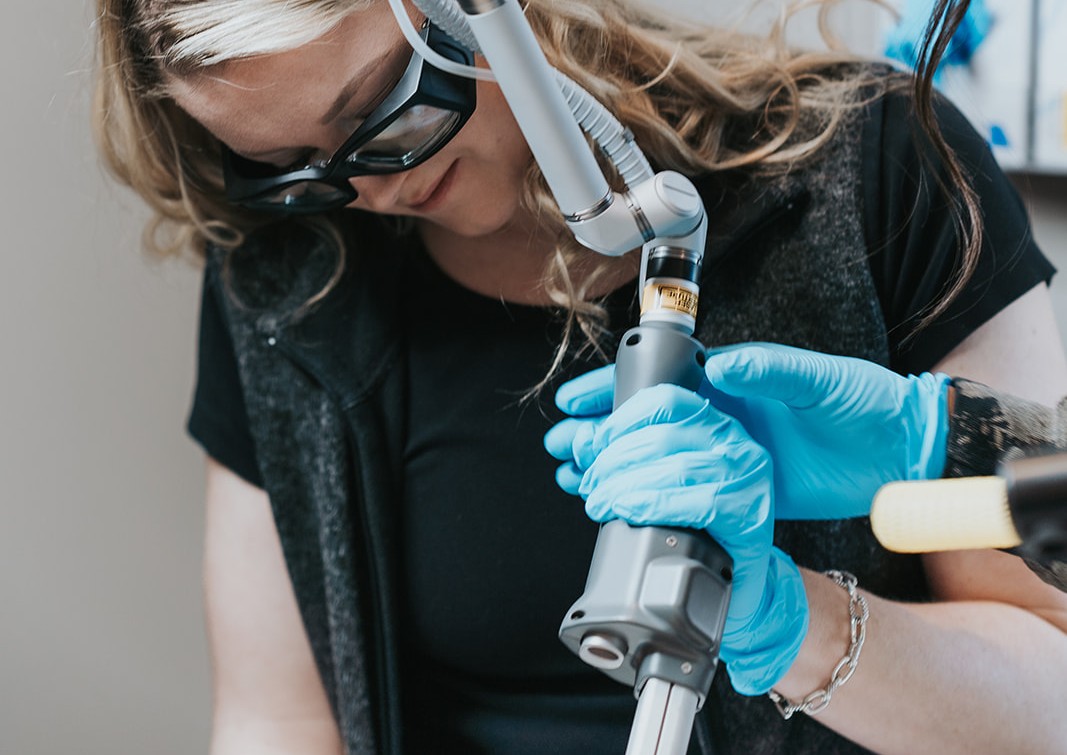 Aesthetic practitioner administering Botox injections to a patient’s forehead, illustrating the procedure discussed in the ultimate guide to Botox treatments.