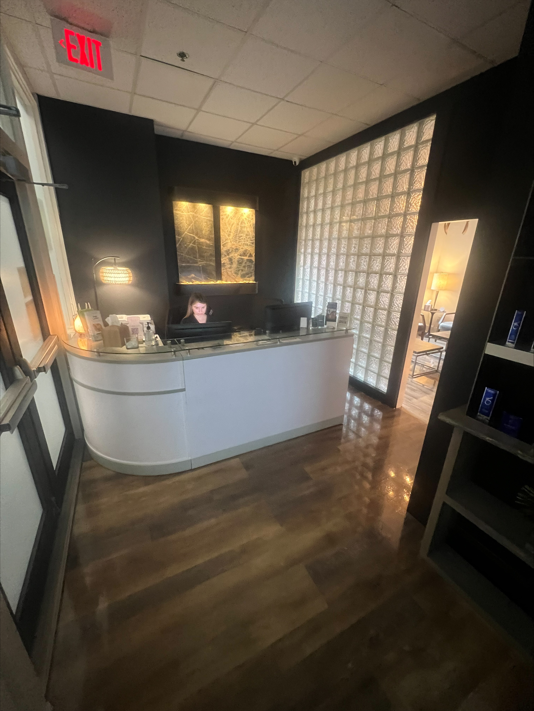 Front desk area of MD Esthetics Pittsfield location, showcasing modern design and welcoming ambiance.